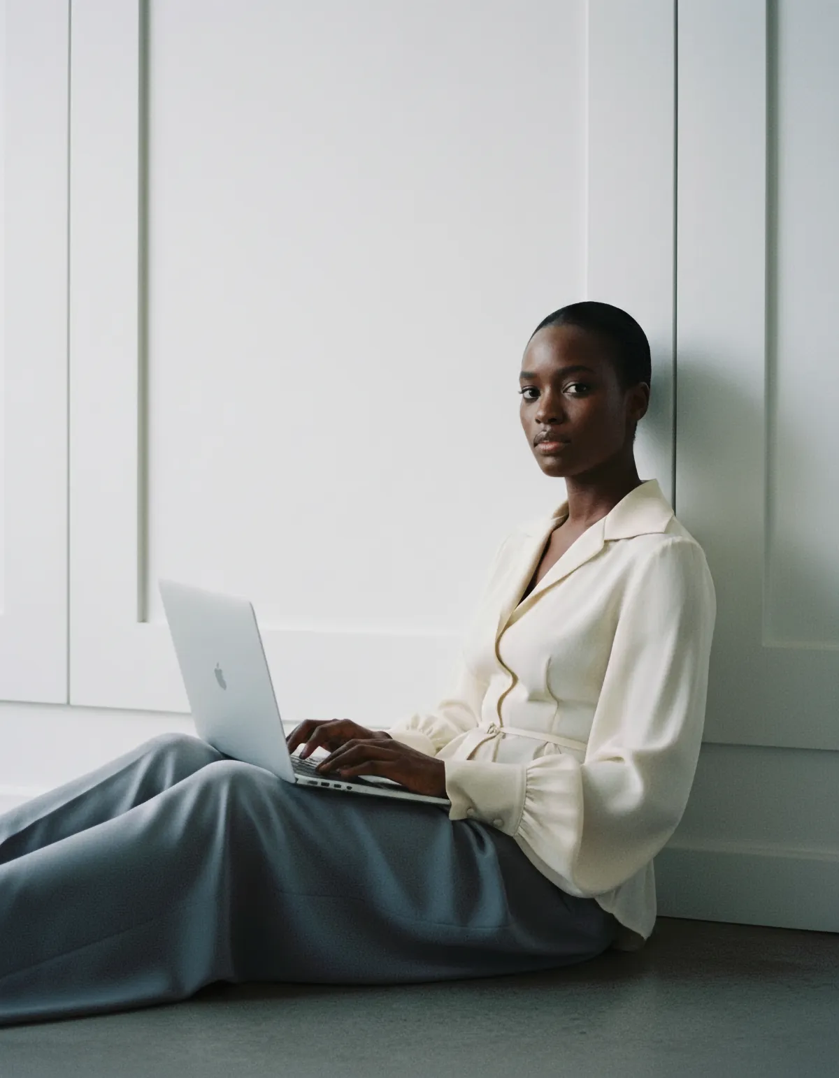 woman working to drive more traffic to her website on a modern laptop computer