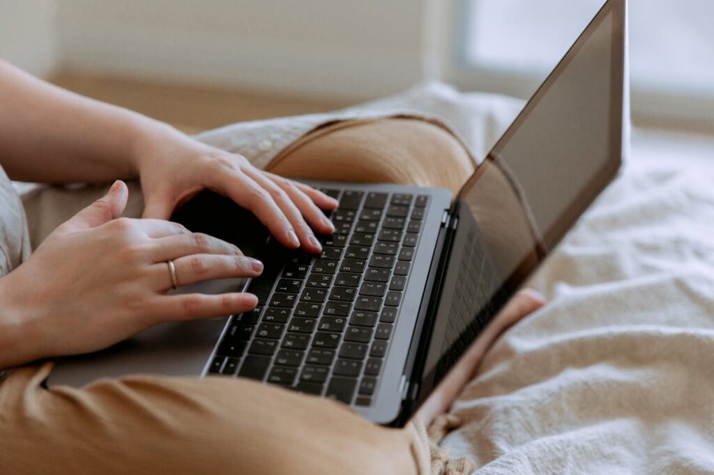 female business owner typing on a computer